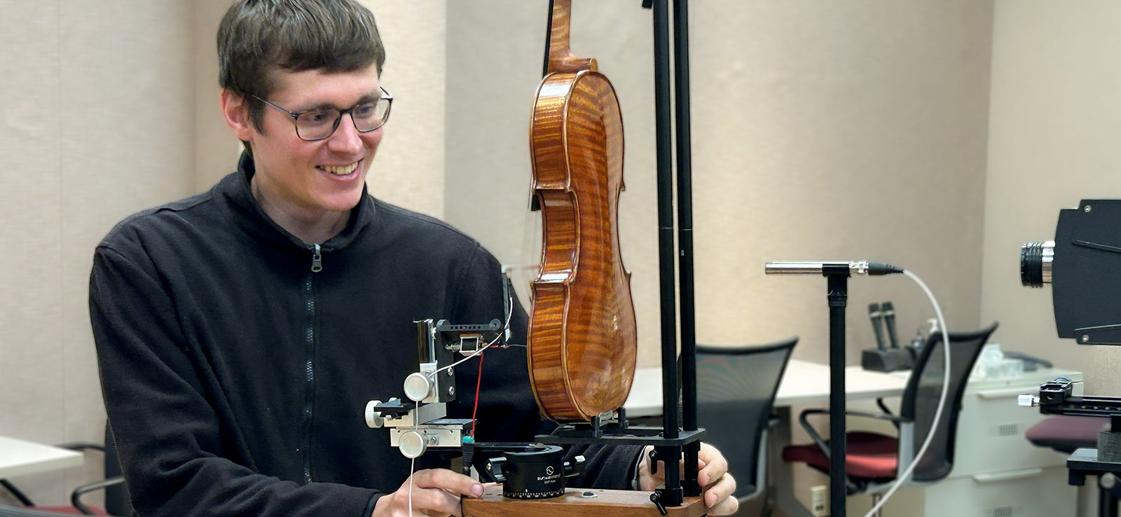 Violin researcher with violin