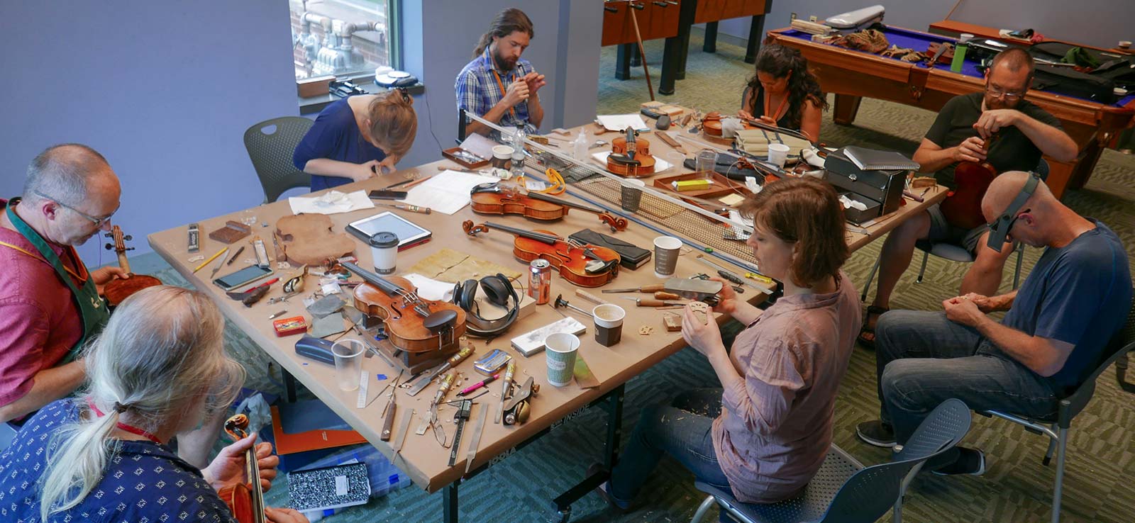 Violin researchers actively working on violins
